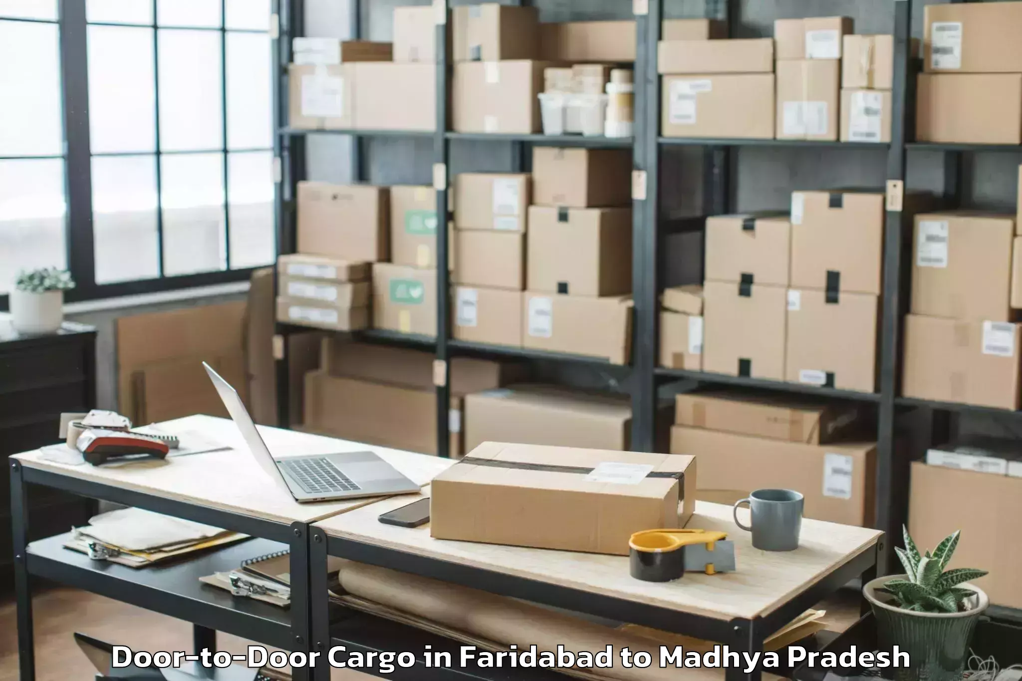 Reliable Faridabad to Ganj Basoda Door To Door Cargo